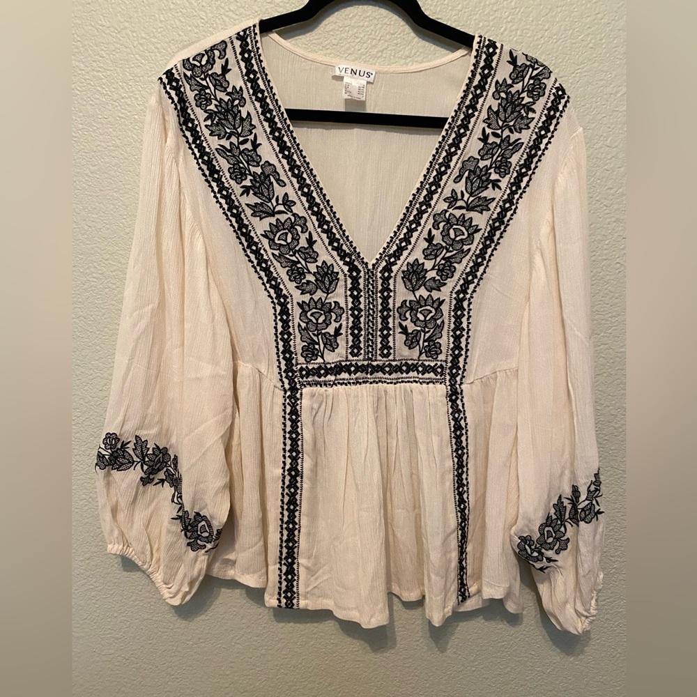 Beautiful long sleeve top with black embroidery